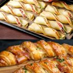 Golden, flaky puff pastry appetizers filled with creamy cheese and herbs, served on a festive wooden board.